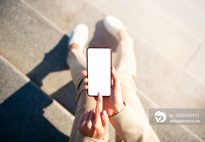 Woman using mobile phone in the city, screen mockup for your app design