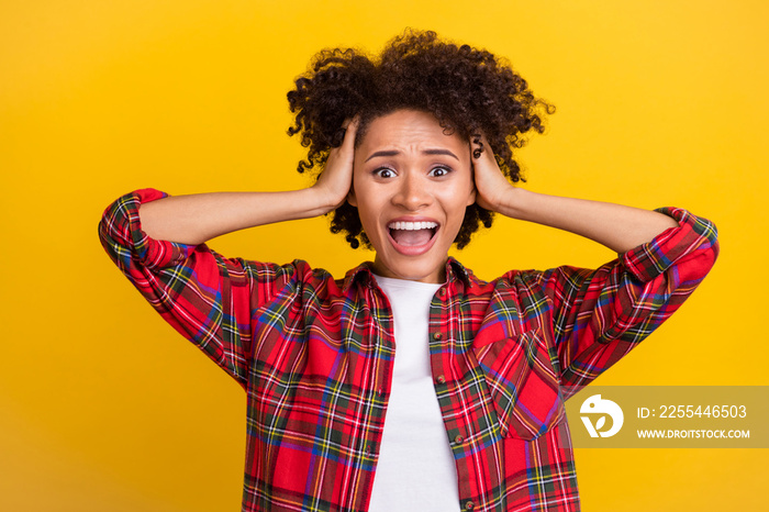 Portrait of attractive overwhelmed amazed girl sudden news reaction isolated over bright yellow color background