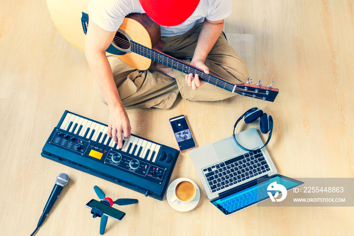 male musician, artist streaming his live concert at home