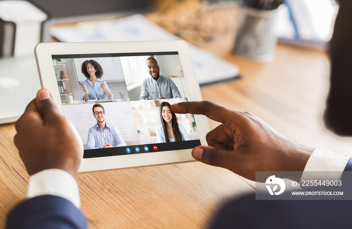 Remote Meeting. Black Businessman Using Digital Tablet For Online Conference With Colleagues