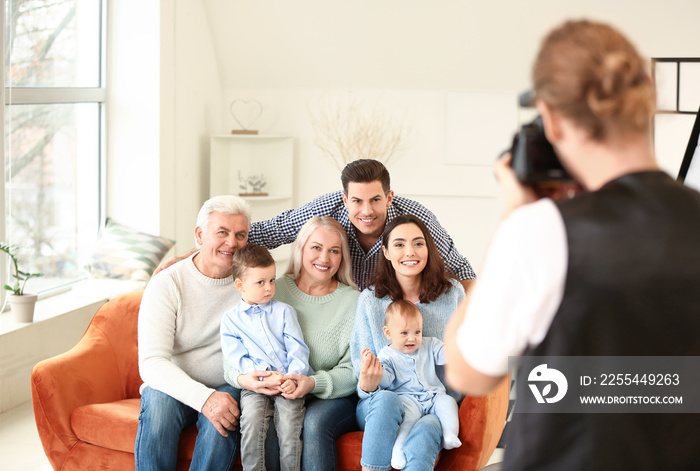 Photographer working with family in studio