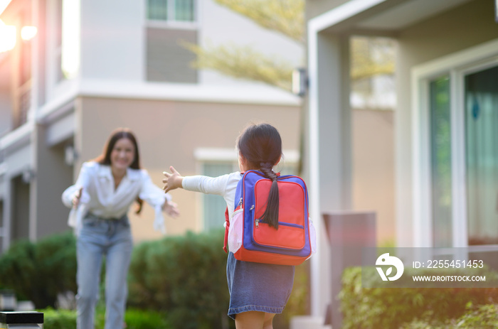 girl daughter running exciting to mother welcome home after school study