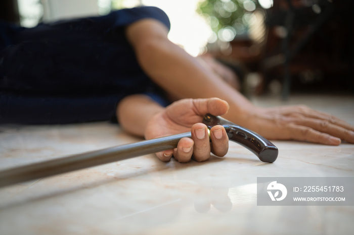 Senior man falling down at home because stumbled on a door kerb