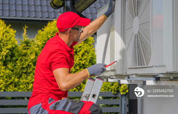 Residential Air Conditioning Maintenance Technician at Work