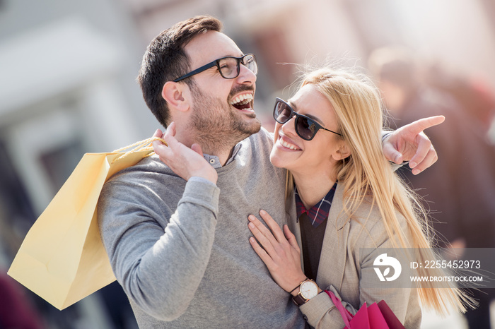 Couple with shopping bags