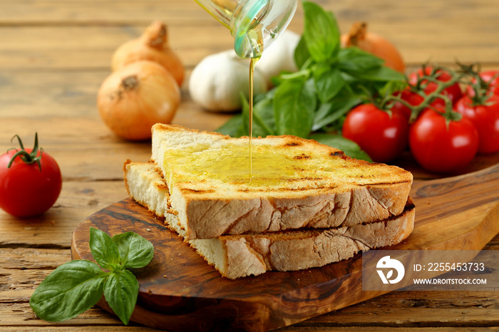 bruschetta tradizionale pane e olio  su sfondo rustico