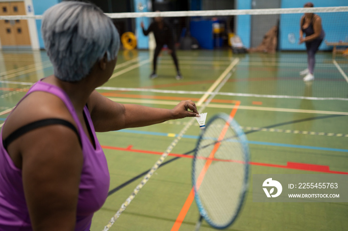 Women playing badminton