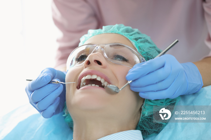 Woman in dentist chair, appointment at dentist doctor, checkup teeth