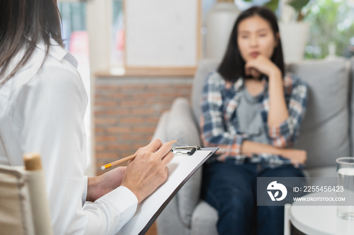 psychologist talking with depressed patient about mental condition.