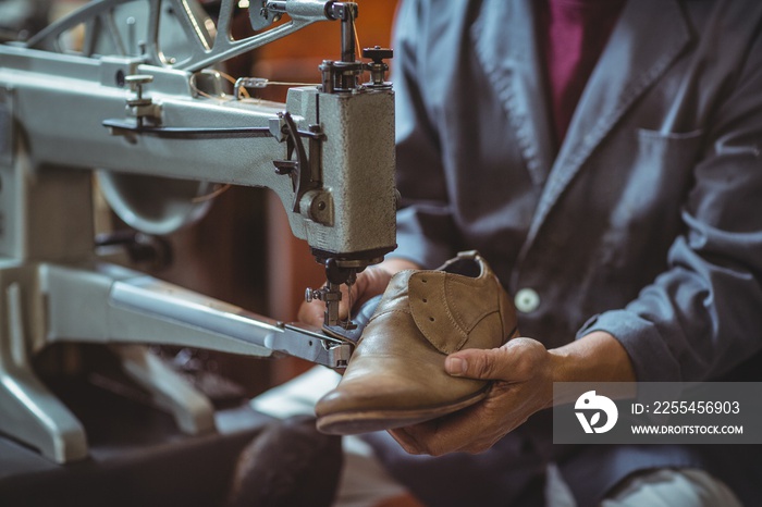 Shoemaker using sewing machine