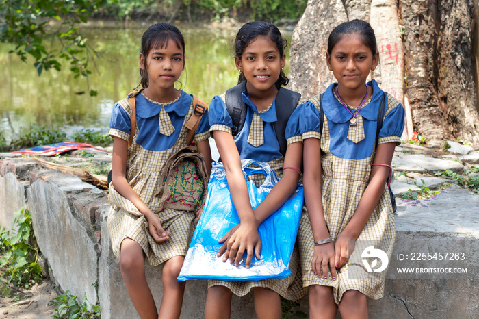 School Girls Students sitting in outside