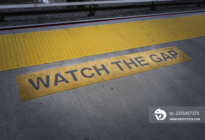 WATCH THE GAP sign in the subway