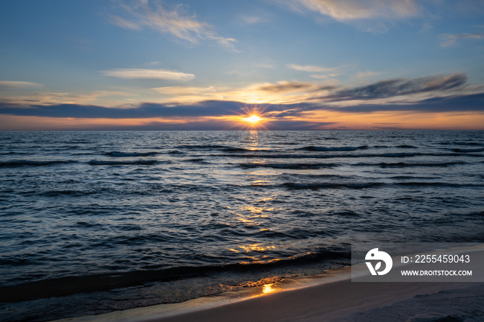 Sunset at Lake Michigan, Ottawa Beach, in Holland, Michigan.