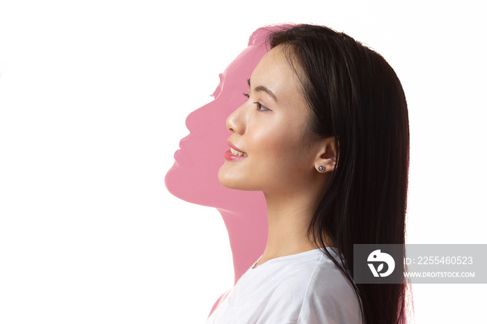 Multiple exposure portrait of asian woman with positive smile and serious sad facial expression. Mental health, depression and emotions concept