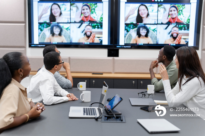 Business people attending video conference