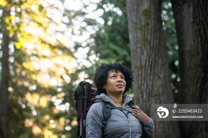 U.S. Army female soldier putting in the miles with an early morning hike in the NorthWest.