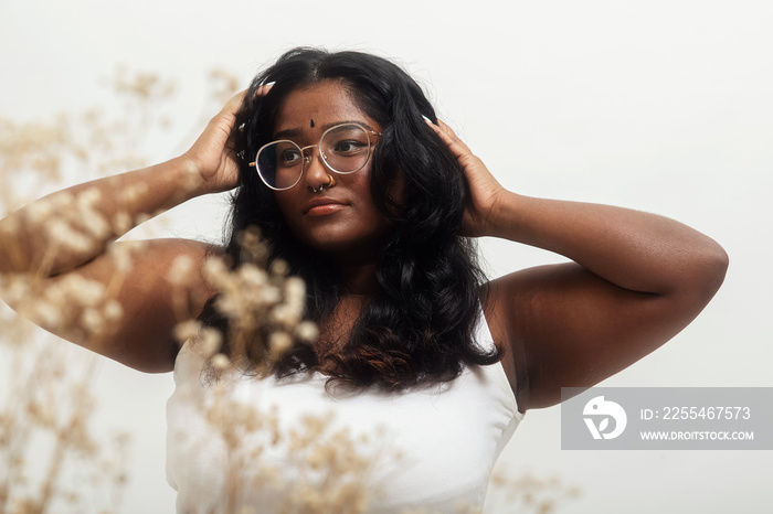 South Asian female solo lifestyle studio portrait shot