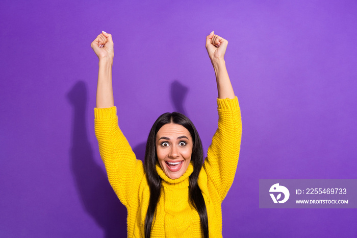 Photo of astonished cheerful person open mouth raise hands fists celebrate isolated on violet color background