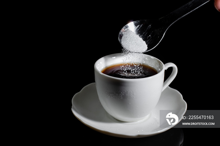 Sugar in coffee cup . warned that the sugar too much will make unhealthy nutrition, obesity, diabetes, dental care and much more.