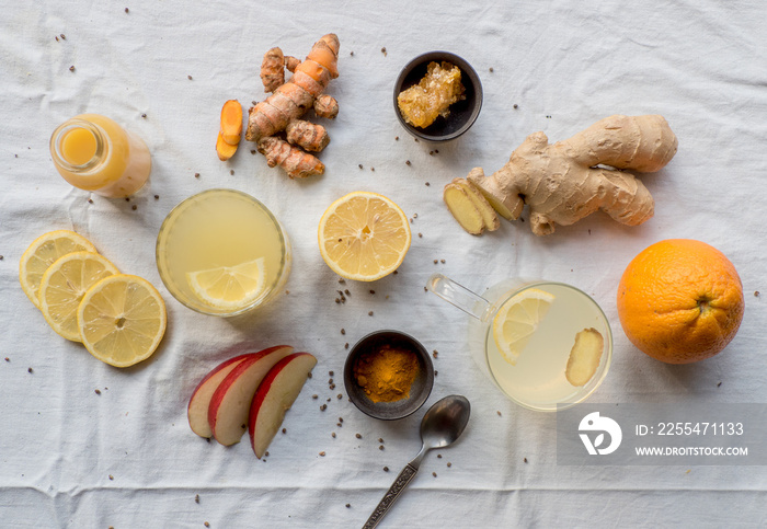 Various immune boosting citrus drinks with ginger and turmeric