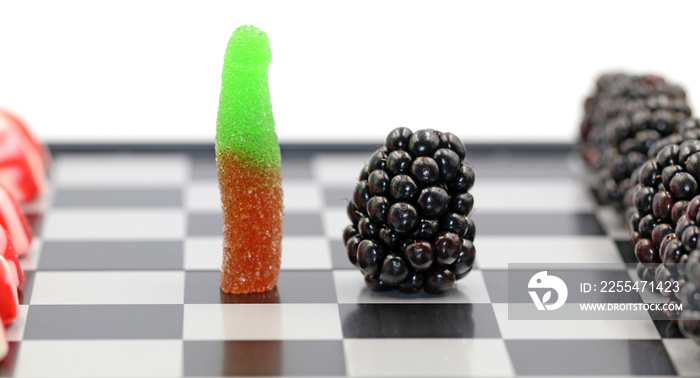 The chess game between healthy foods and antioxidants against sweets and unhealthy foods