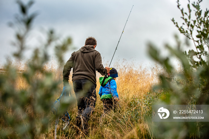 Father and son going fishing