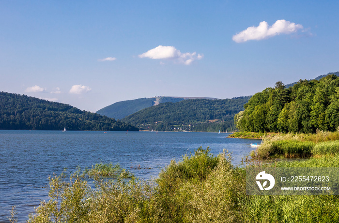 View on the Żywieckie Lake and the Żar Mountain in the background on a sunny afternoon