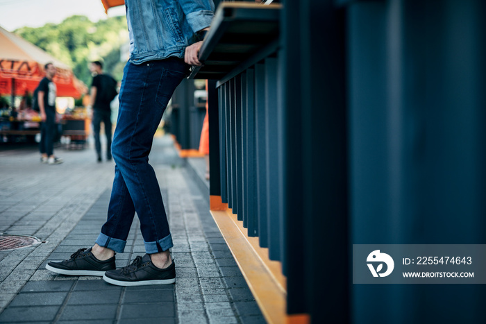 Stylish male near urban stall stock photo