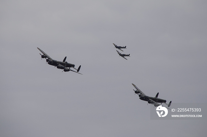 The RAF’s iconic Avro Lancaster heavy bomber escorted by Supermaine Spitfires