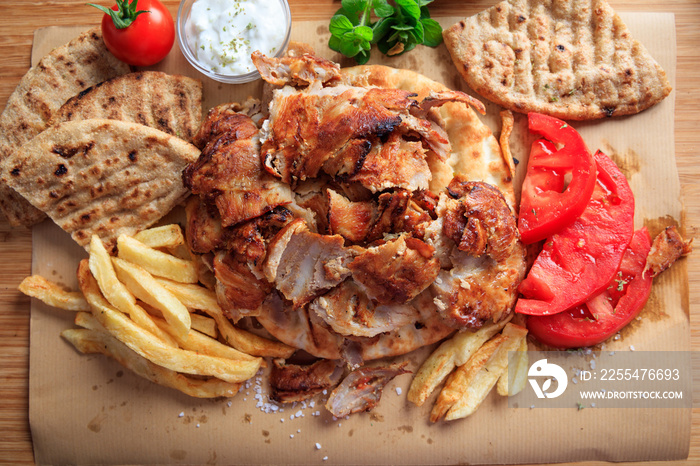 Greek gyros dish on baking paper - top view