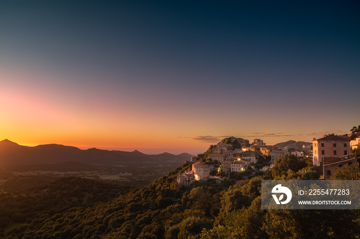 Village of Belgodere in Corsica lit by dramatic sunset