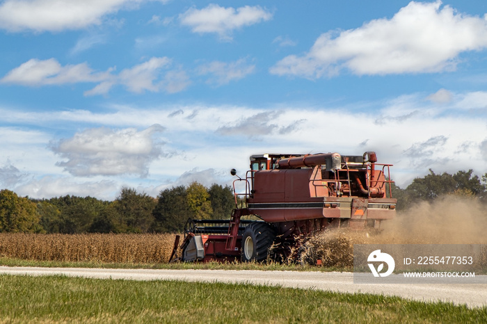 Combine Harvesting Field of Soybeans