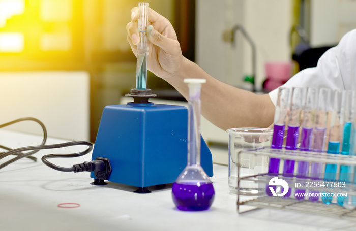 Chemists are researching, studying and development to find new compounds that are resistant to viruses. to find chemicals to resist viruses In the Chemical laboratory, Thailand. Selective Focus.