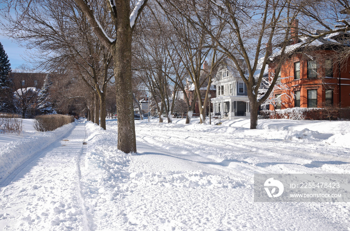 snow covered neighborhood in historic hill district of saint paul