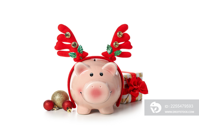 Concept of Christmas finance with piggy bank, isolated on white background