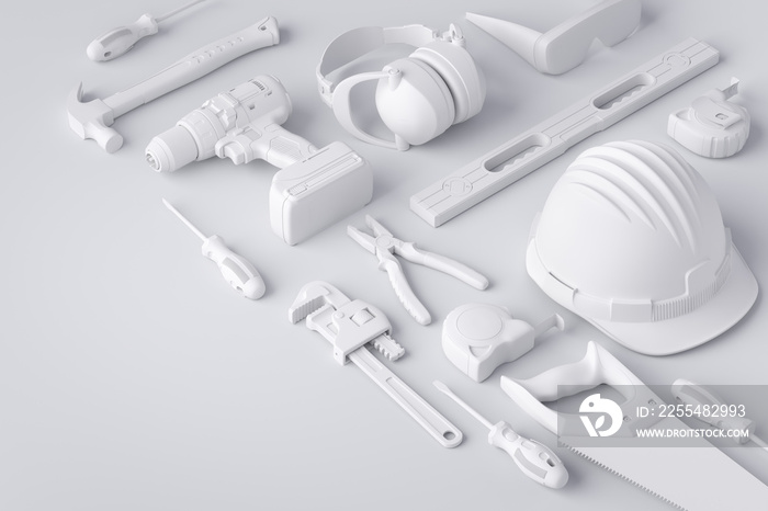 Top view of monochrome construction tools for repair and installation on white