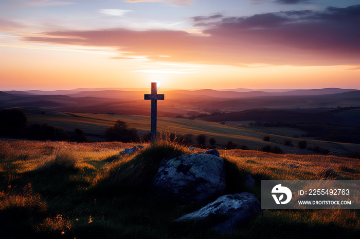 Cross centered in the background of a stunning sunset.