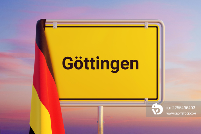 Göttingen. Gelbes Schild/Ortsschild. Flagge von Deutschland hängt darüber. Himmel mit Sonnenuntergang oder Sonnenaufgang