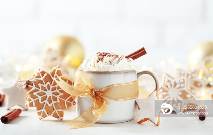 Beautiful composition with cup of cappuccino and Christmas cookies