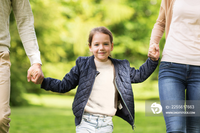 happy family walking in summer park