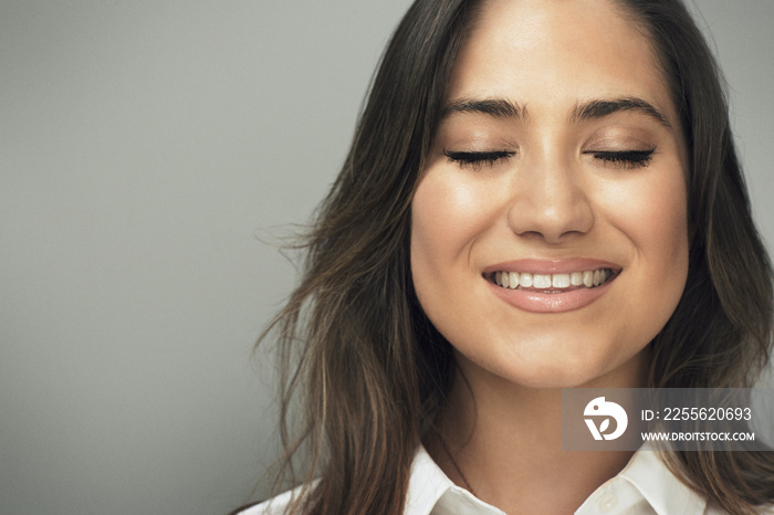 Portrait of smiling young woman