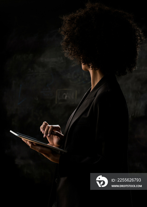 Businesswoman using digital tablet