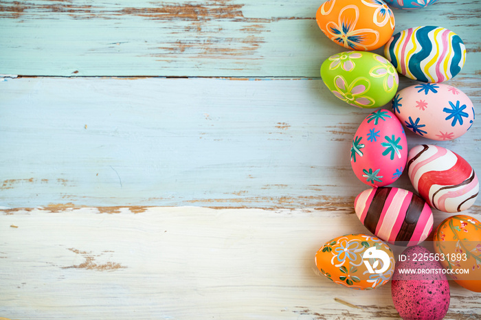 flat lay of colorful vibrant red green pink and orange easter eggs with stripe and flower pattern pa