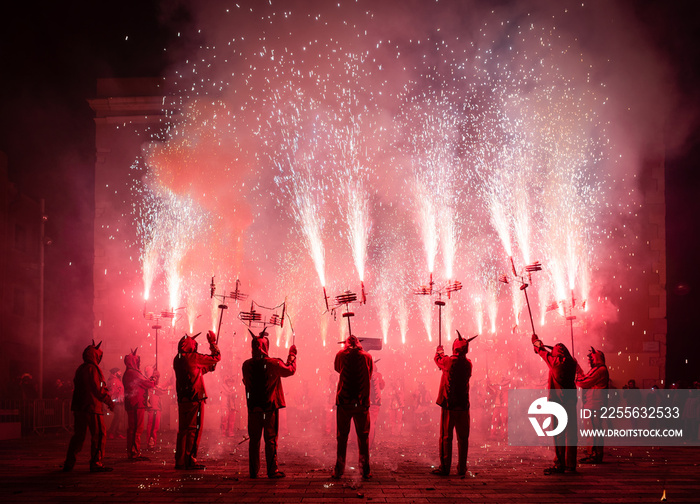 Typical Correfocs of Catalonia, a type of fireworks managed by men dressed as devils