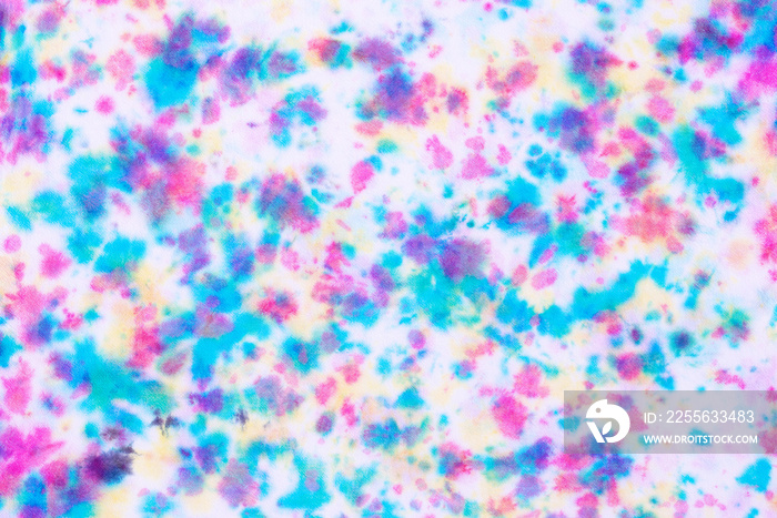 colorful tie dye pattern hand dyed on cotton fabric abstract texture background.