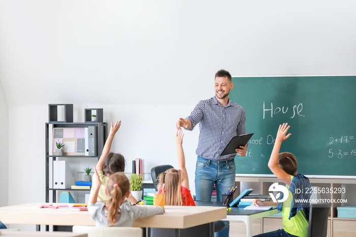 Teacher conducting lesson in classroom