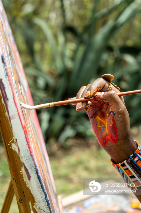 close up of a hand painting