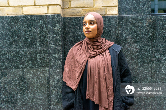 Portrait of young woman wearing�hijab