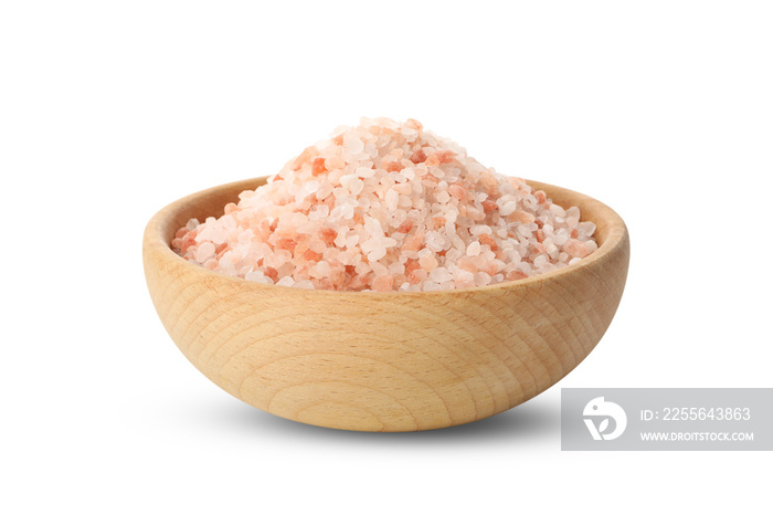 Wooden bowl with pink himalayan salt isolated on white background