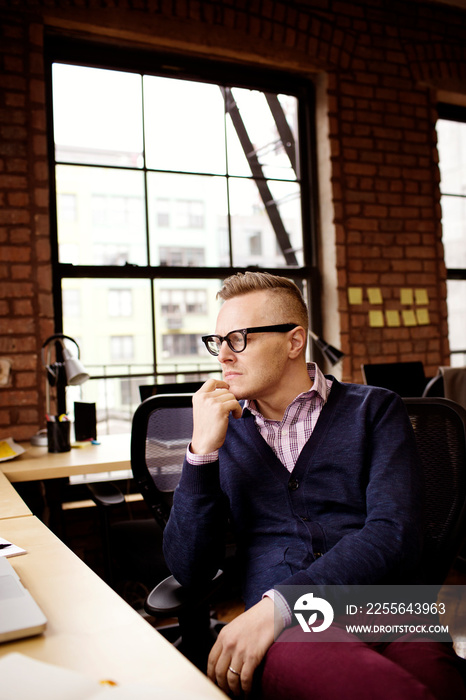 Portrait of businessman in office